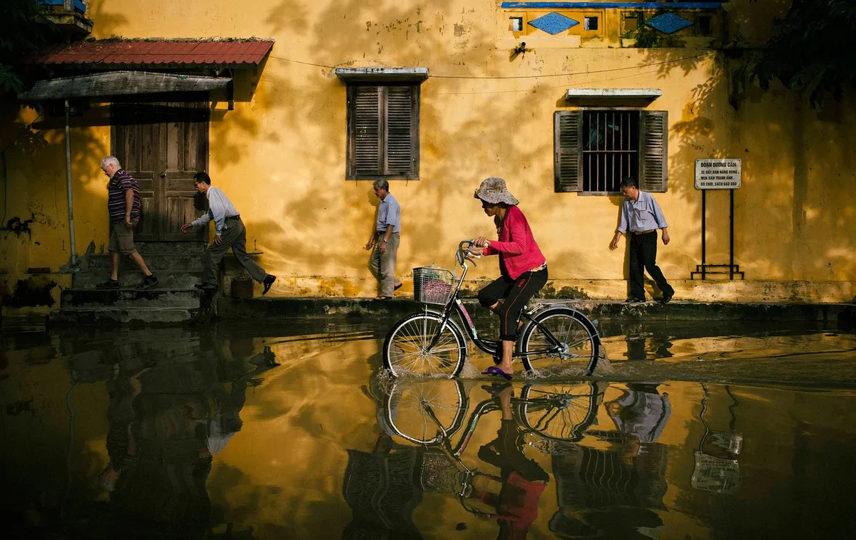 biking, street, flood, nature, city, bike, bicycle, bicycle ride, riding bike, flooding, water, water reflection, road, hoi an, vietnam, flooded street