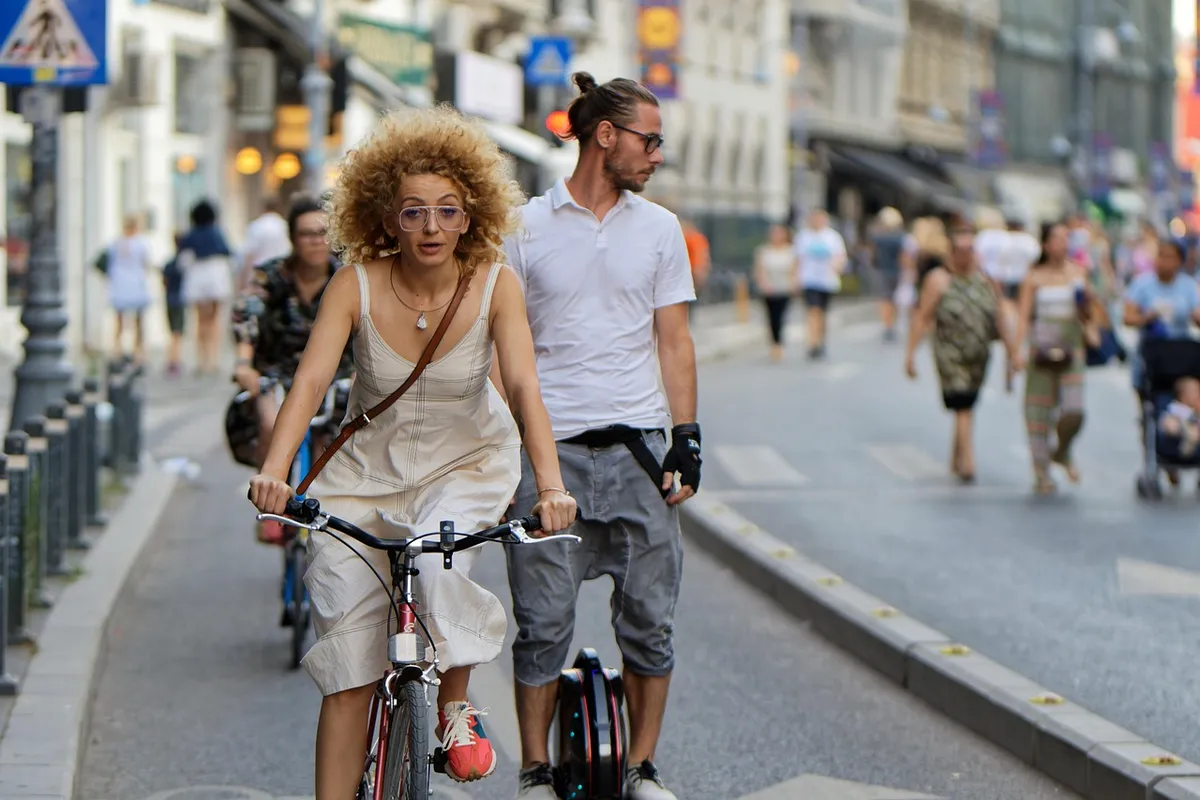 woman, bicycle, street, bike path, people, promenade, man, wheel, travel, urban, outdoors, bike track, lane, glasses, snapshot, street photography, weekend, tra
